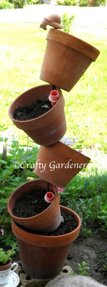 water smiles in the tipsy pots at craftygardener.ca