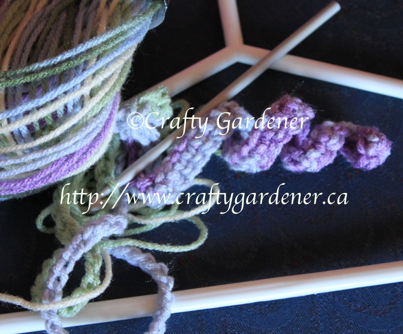covering coat hangers with a long crochet strip at craftygardener.ca