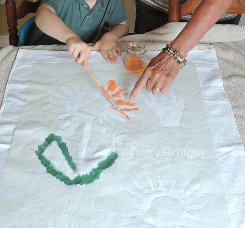 painting a garden flag at craftygardener.ca