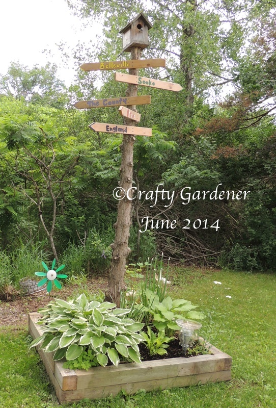 the sign post garden June 2014 - craftygardener.ca