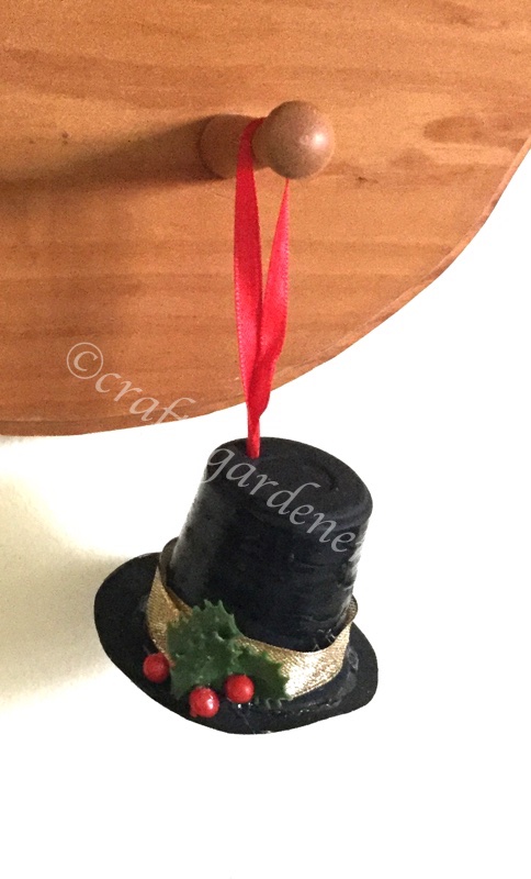 how to make a snowman hat out of a coffee pod container at craftygardener.ca